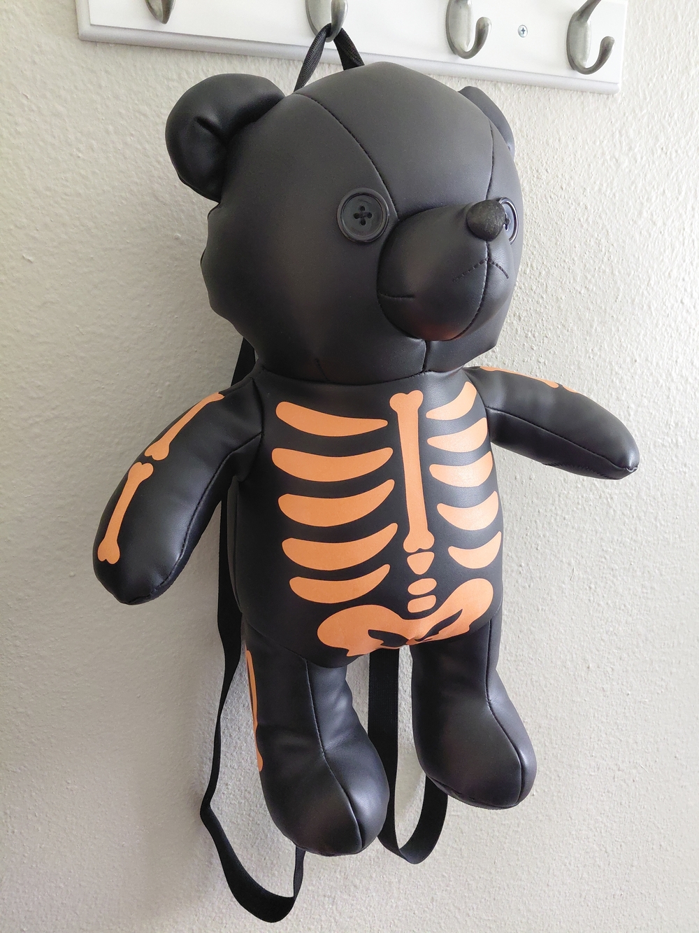 Black Teddy Backpack with Orange Skeleton Print